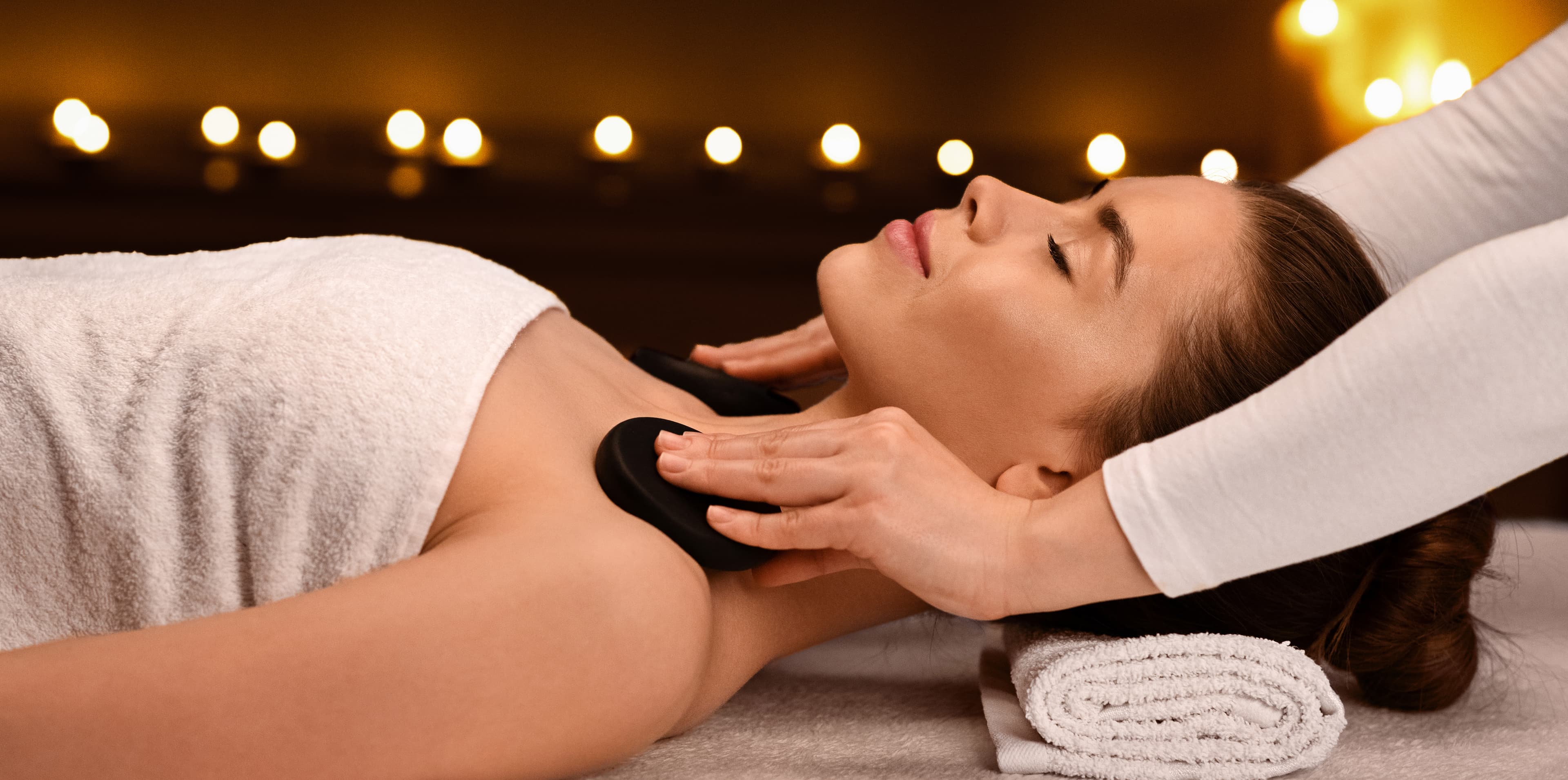 Hot stone shoulder treatment